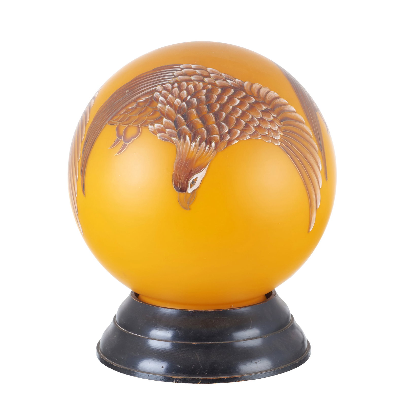 EMILE GALLe STYLE - Table lamp: France, c.1900, Art Nouveau, spherical body in orange cameo glass, with polychrome decoration depicting eagles; circular wooden base. Electrified. Signs of use. Dim.: 36 cm.