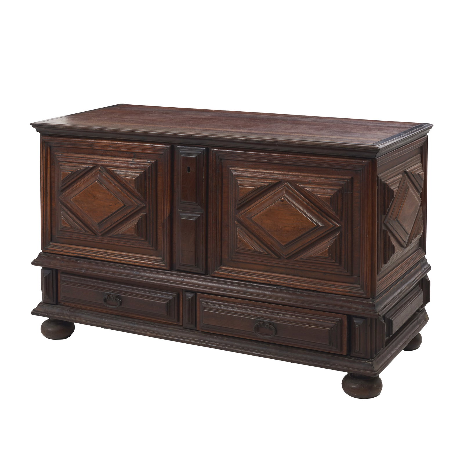 Portuguese rosewood Ark: Portugal, 17th/18th century; in rosewood, with two drawers; padded sides and front with geometric diamond-point reliefs; resting on four flat feet; iron hardware. Signs of use. Dimensions:
