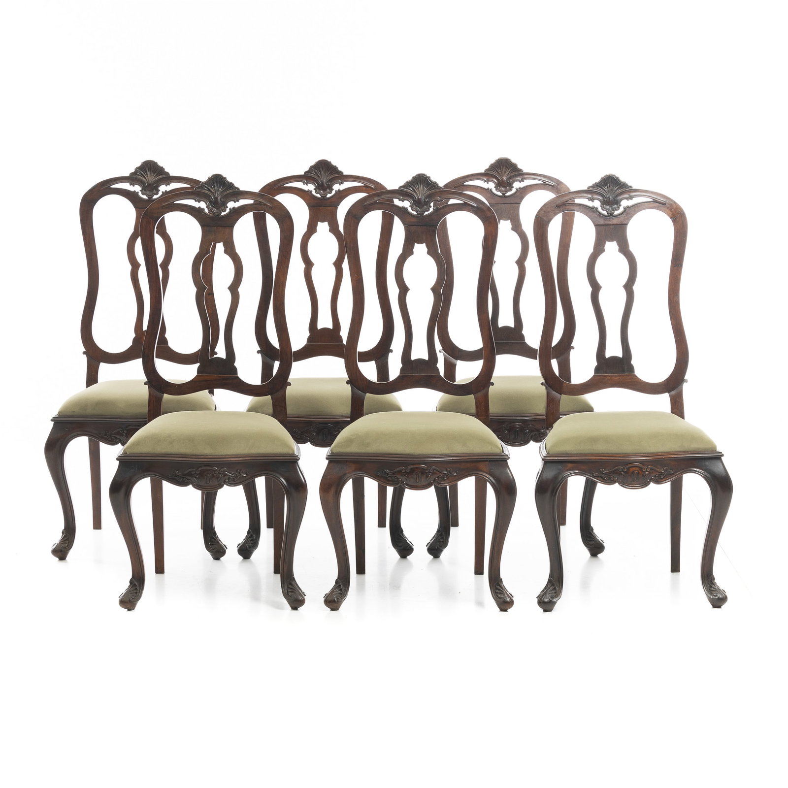 Six D. Jose / D. Maria rosewood chairs: Portugal, 18th century, in rosewood, backrests with carved tops and cut-out frames, seats upholstered in suede from a later period, curved legs with protruding knees and scroll feet. Signs of use.