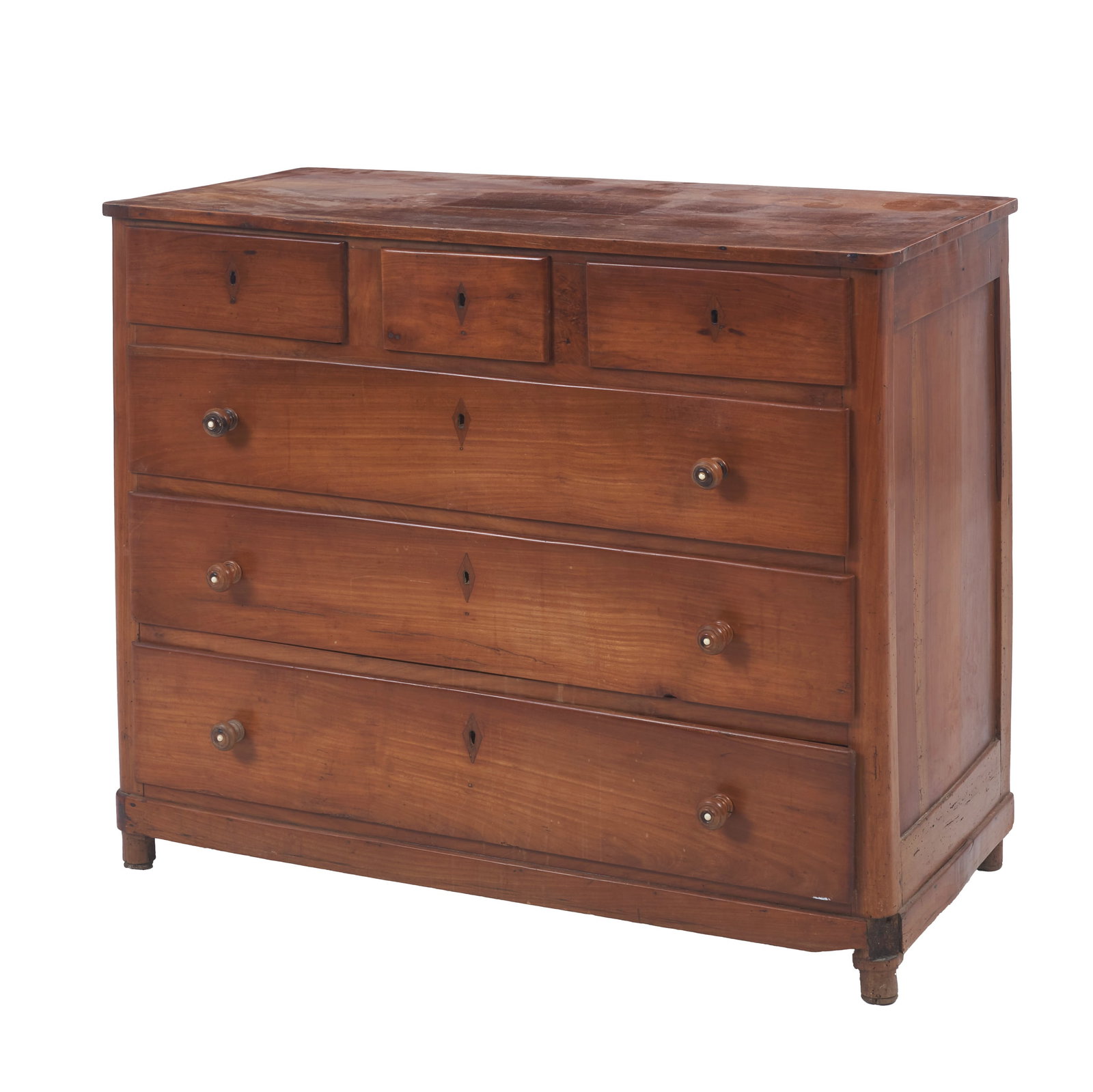 D. Maria Chest of Drawers: Portugal, 19th century, made of vinhatico, with three drawers and three deep drawers, turned handles. Signs of use. Dim.: 91.5x109x52cm.