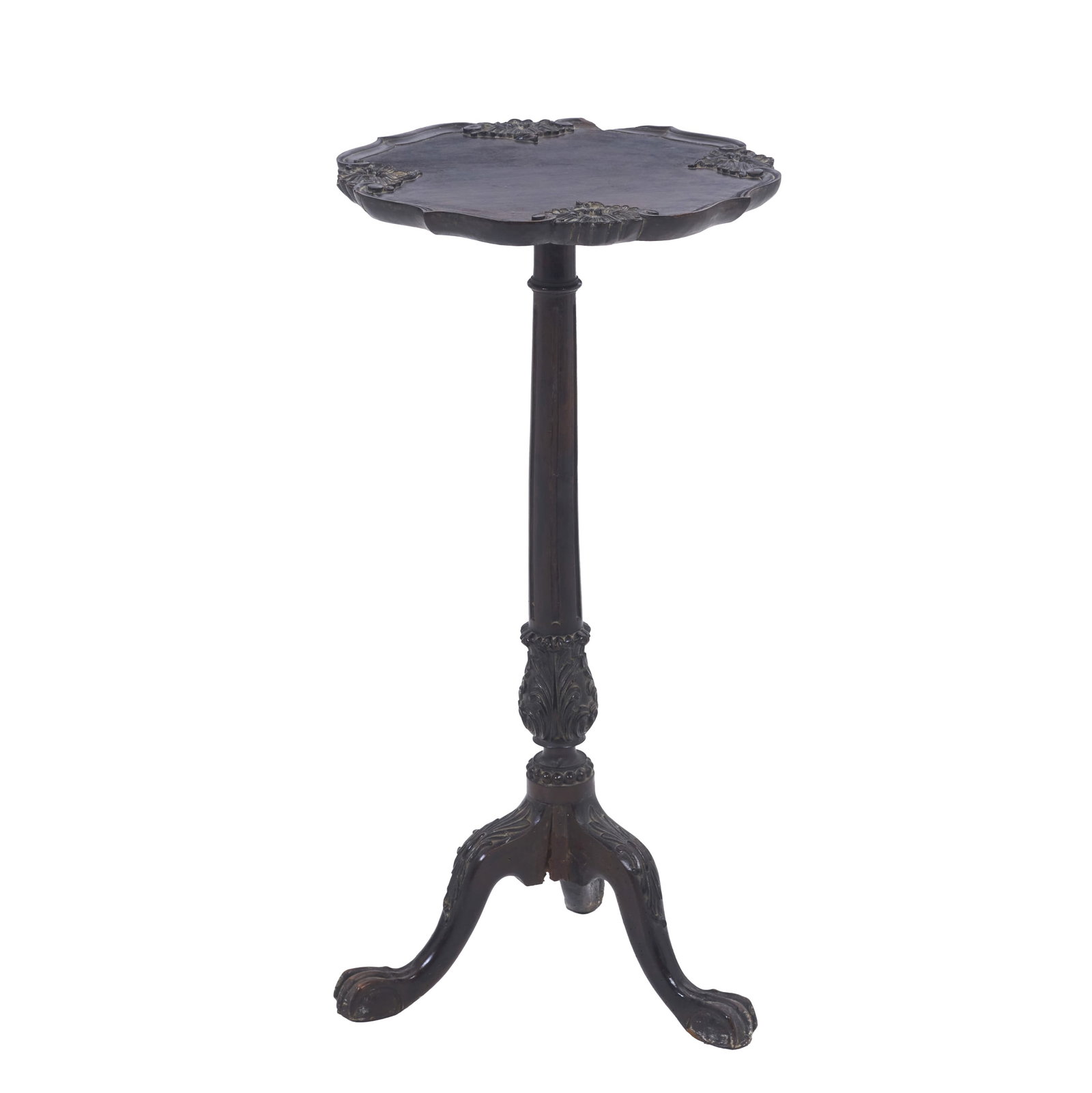 Tripod Table: Portugal, 19th century, carved walnut lacquered black, scalloped top, decorated with plant and floral motifs; fluted column, claw feet. Signs of use, minor defects, traces of woodworm. Dim.: