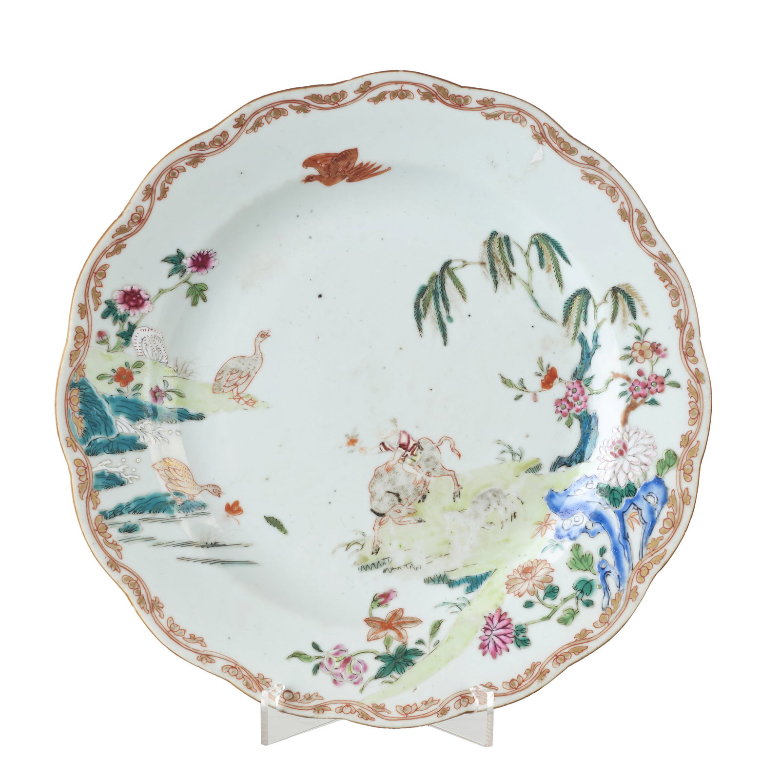 Chinese porcelain plate 'boy and buffalo', Qianlong: China, Qianlong period, polychrome enamel decoration in the pink family and gold, depicting a boy with animals in a landscape. Signs of use and age on the painting. Dim.: 22.5cm.