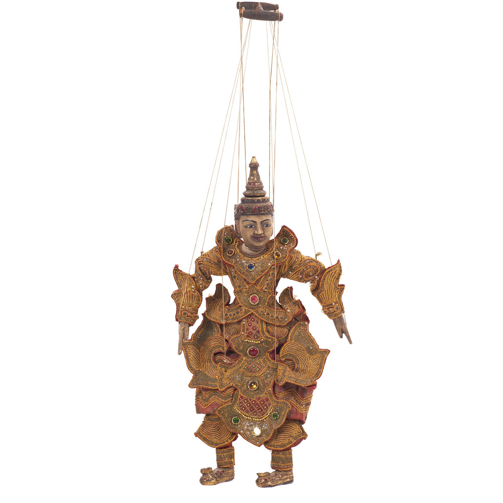 Yoke The' string puppet: Burma, mid 20th century, made of wood with silk robes, decorated with sequins, beads, gold thread embroidery and coloured stone inlays. Signs of use. Dim.: 66 cm.