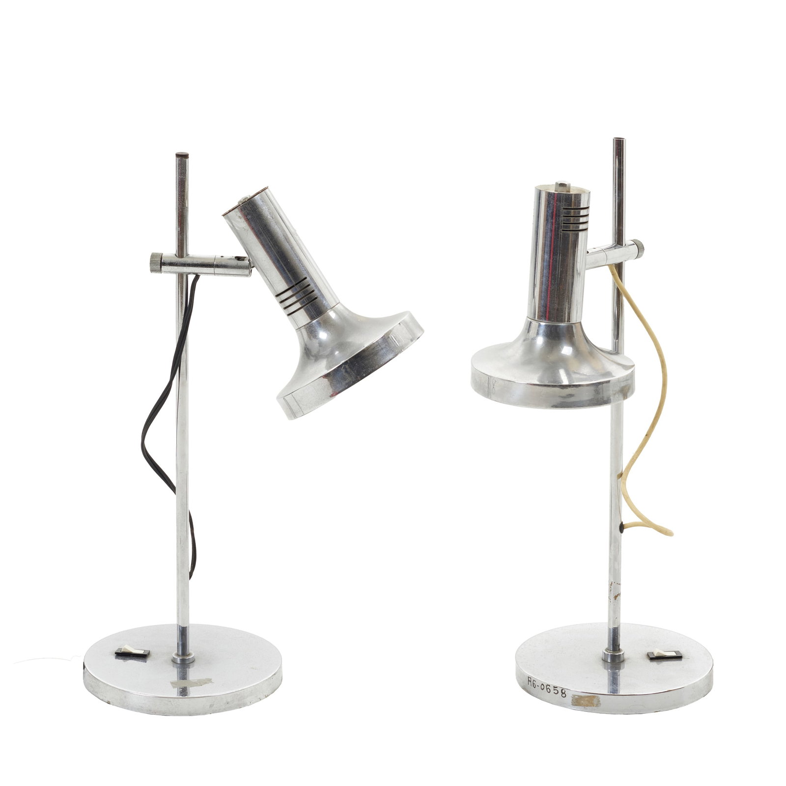 KOCH & LOWY - Pair of table lamps: Iserlohn, Germany, c.1970, designed by Koch & Lowy for 'OMI', in nickel-plated metal with an adjustable shade. Marked. Signs of use. Dim.: 57cm.