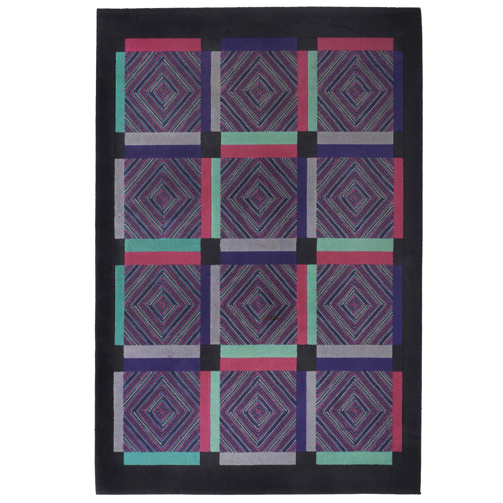 MISSONI - Modernist Rug: Italy, c. 1980, in wool yarn, polychrome decoration, geometric pattern. "Missoni Home" label on the back. Signs of use, minimal flaws. Dim.: 160x240cm.