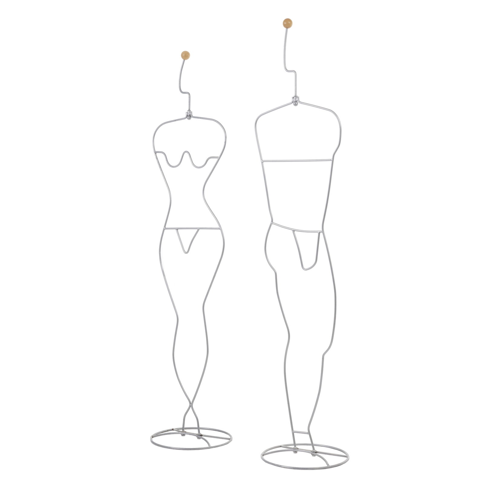 EHLeN JOHANSSON (b. 1958) - 'HApen' Valet: Sweden, c. 1980, designed by Ehlen Johansson for IKEA; made of silver-lacquered tubular steel wire, with a wooden sphere on top; female and male versions. Signs of use. Dim.: 181cm and 190cm.
