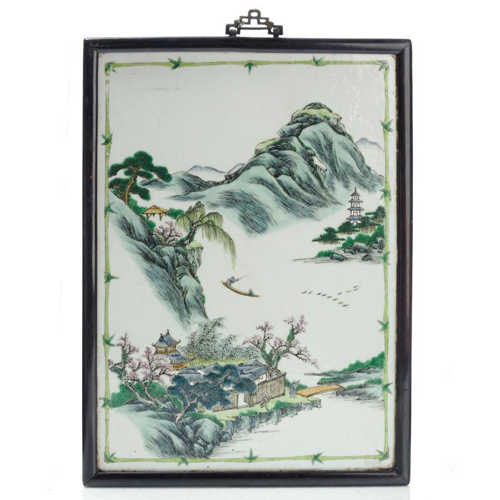 Plaque 'mountains landscape' in porcelain from China: China, 20th Century, Minguo period, enamels decorate mountainous landscape with houses and figures. Dim.:41x28,5cm.