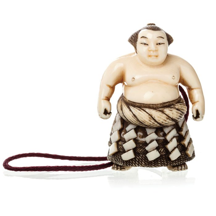 Netsuke 'Sumo', Meiji: Japanese polychrome ivory netsuke, Meiji period, delicate sculpture representing Sumo wrestler. Signed. Dim.: 5.3 cm.
