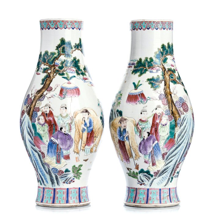 Pair of vases 'figures with elephant' in Chinese p: China 20th Century, Minguo period, polychrome decoration of figures in landscape with elephant. Apocryphal Daoguang Mark on base. Dim:. 38.5 cm.