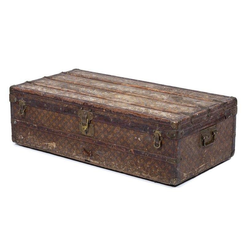 LOUIS VUITTON - Travel suitcase: Travel suitcase, 19th century/20th century, wood coated with fabric with monogram 'LV', marked 'LOUIS VUITTON', numbered 169991, fittings and castors in iron. Signs of wear, worn out fabric, small def