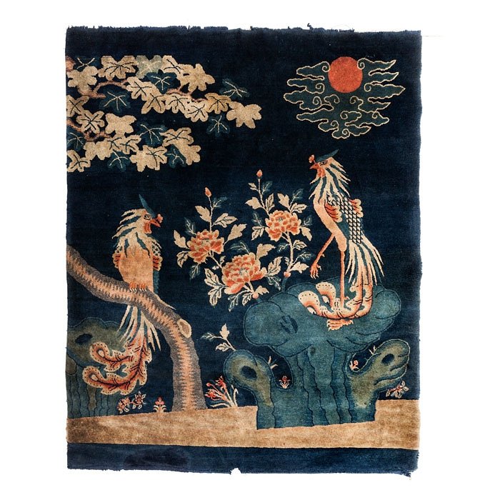 Chinese carpet with phoenixes: China, Guangxu period / Minguo, polychrome wool yarn, rocky landscape with phoenixes. Signs of use. Dim.: 188x160cm.