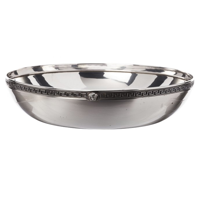GIANNI VERSACE - Silver bowl: Italian silver, Florence assay mark, remarked eagle (post-1985), marked 'Gianni Versace', plain brushed decoration, greek borders and 'medusa' mascaron. Original case. Weight aprox.:288grs. Dim.:22cm.