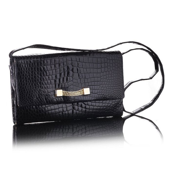 MORABITO - Purse in crocodile leather: Purse in black crocodile leather, removable strap with application of golden chain. Marked Italy. Dim. approx.: 13,5x22,5cm.