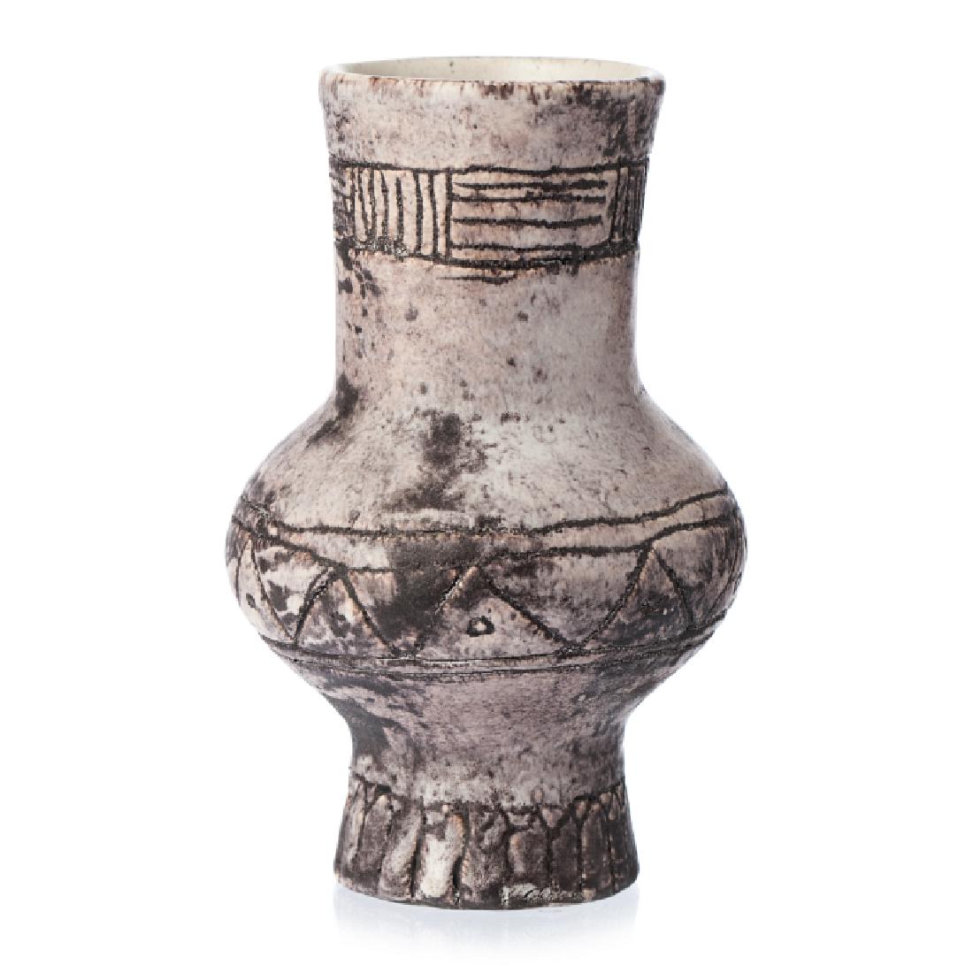 JACQUES BLIN (1920-1995) - Two modernist pitchers in: French ceramic, c.1950, one with incised decoration, the other one with geometrical black decoration. Signed. Dim.:16cm, 22,5cm.