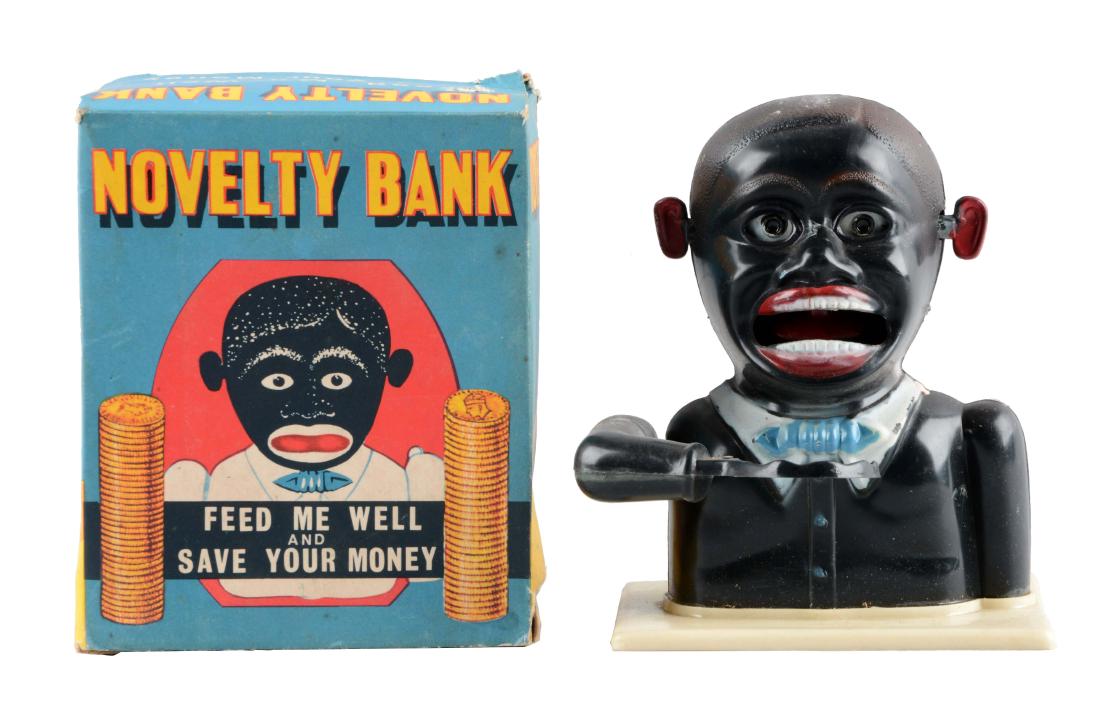 Plastic Jolly Mechanical Bank. (1 of 2)