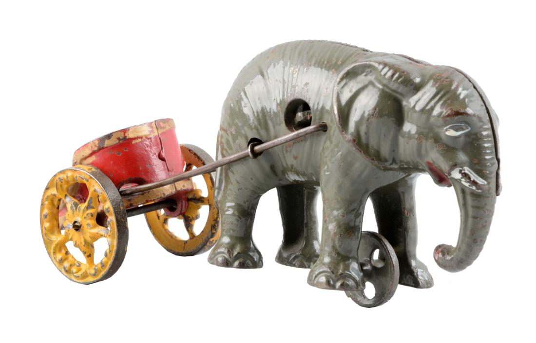 Cast Iron Elephant Pulling Cart Bank. (1 of 2)