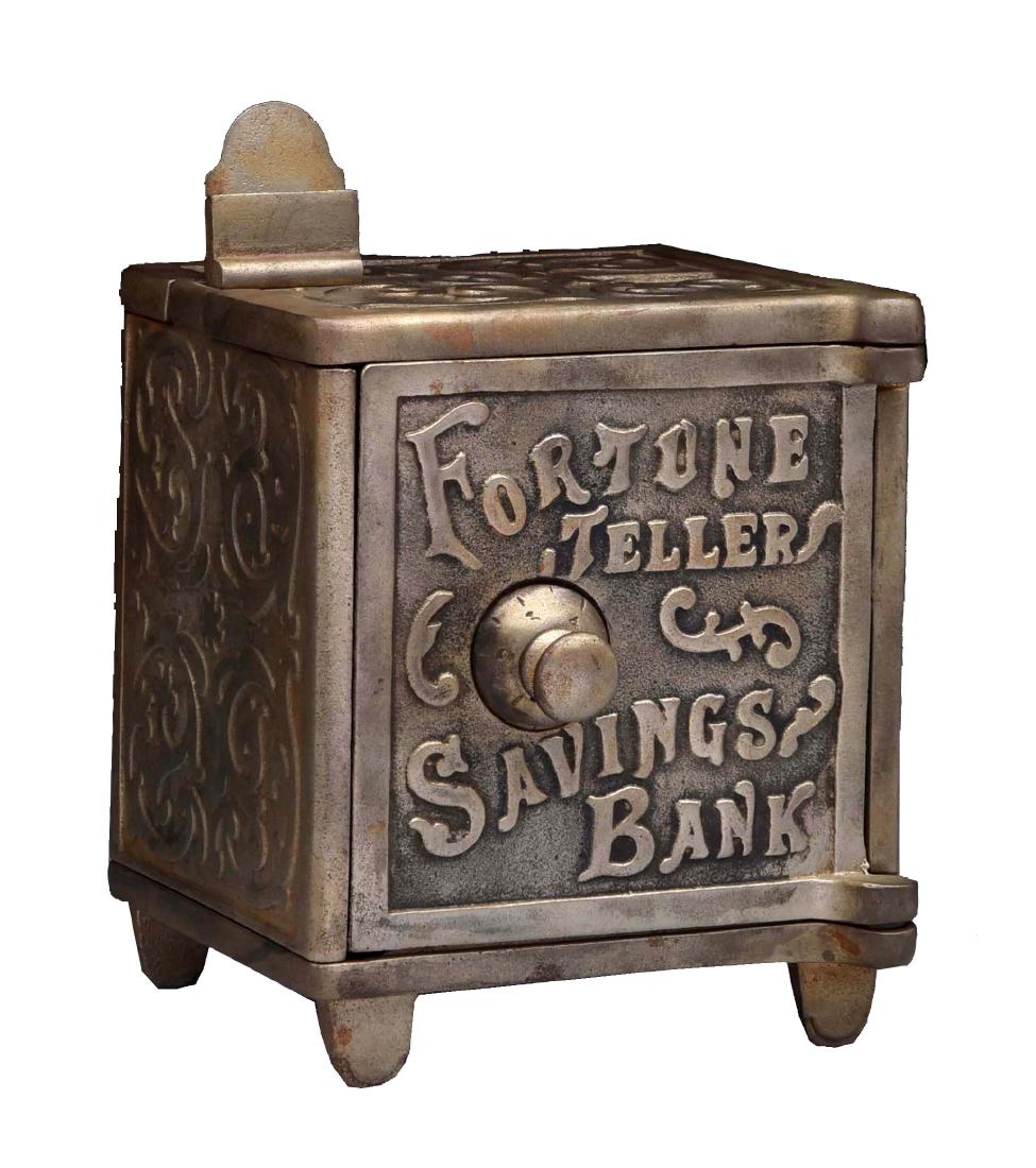 Cast Iron Fortune Teller Savings Bank. (1 of 2)