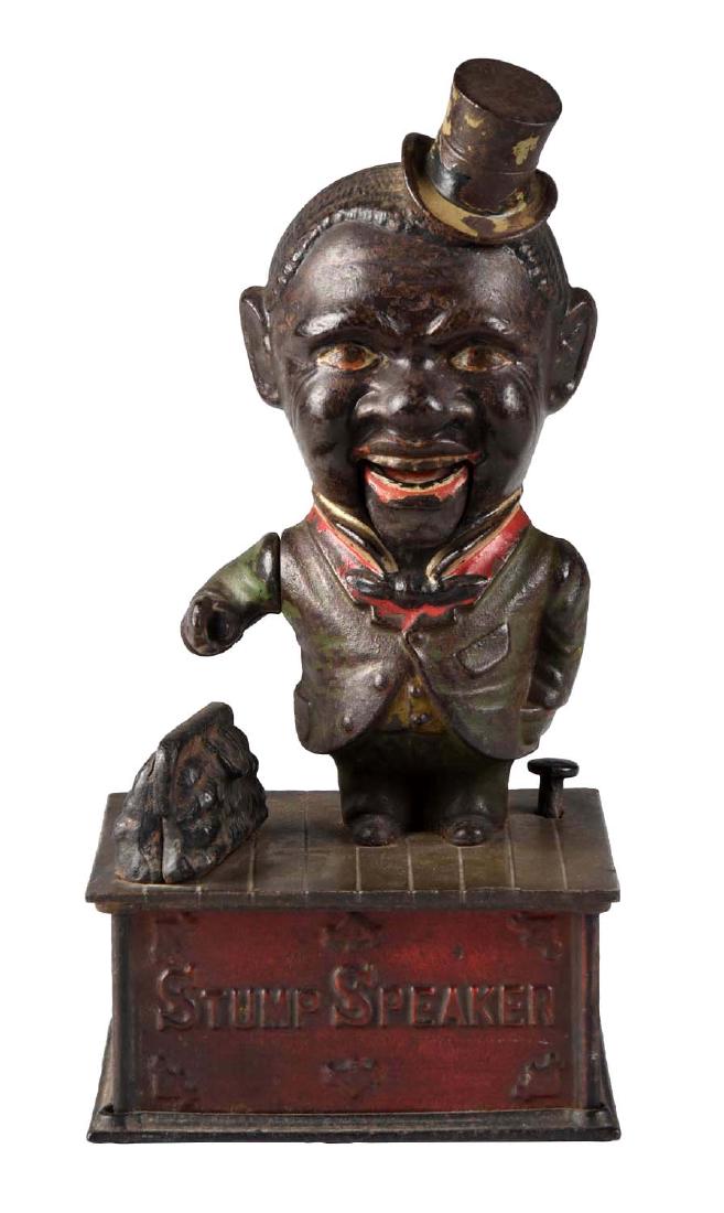 Shepard Hardware Cast Iron Stump Speaker Mechanical: Place coin in the hand of the figure and press lever. The bag opens as the stump speaker deposits the coin in the bag as his chin moves up and down. Old over paint on the reds on the base. (JY). (Good