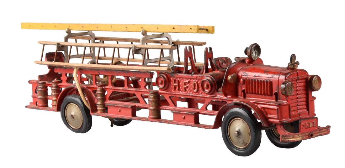 Large Scarce Hubley Ladder Truck.: Replaced hose reel and ladders. Bumper appears original. Supports for hose reel black light slightly different than the rest. Replaced rear figure. Some flattened areas on original tires. (JY). (Very 