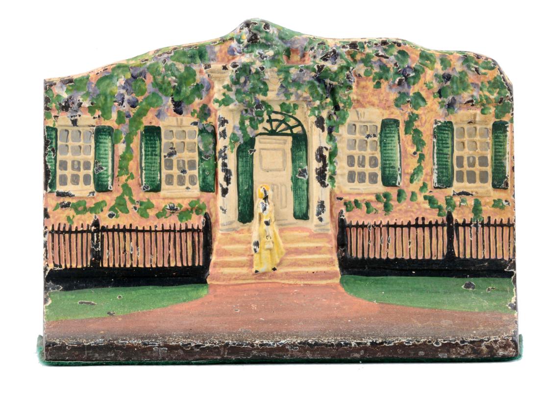 Cast Iron Cottage With Woman On Steps Doorstop. (1 of 3)