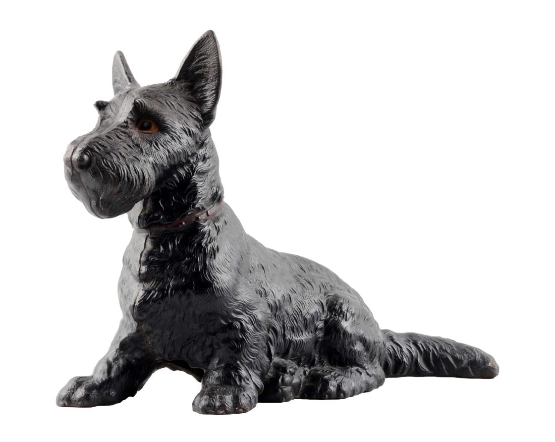 Cast Iron Oversize Sitting Scottie Dog Doorstop.: Made by Hubley. One of the largest dog doorstops produced by Hubley. Full-figure. (Excellent). 17" x 12".
