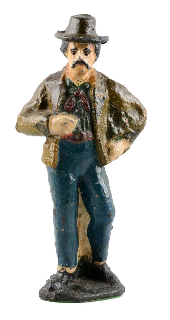 Cast Iron Oversized Gaucho Doorstop.: Full-figure, solid casting that is quite heavy, substantial and oversized. Only example we have seen. Book example. (Excellent). 15 -1/2" x 8 -1/2".