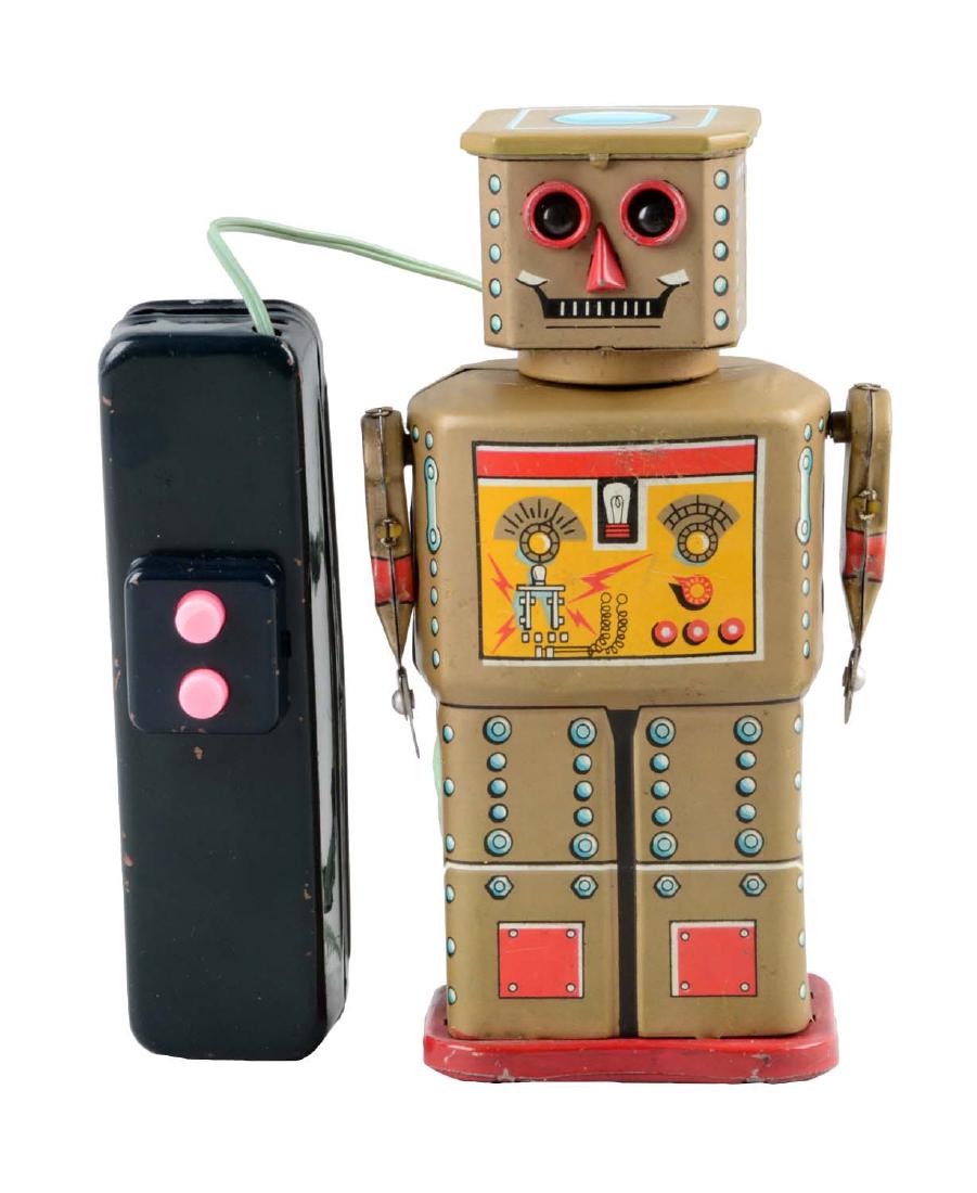 Japanese Tin Litho Battery-Operated Golden Robot.: When in operation robot moves forward via pins in feet while arms move back and forth while eyes light up. Works well. Some scratching and litho loss to battery box. Moderate scratching throughout rob