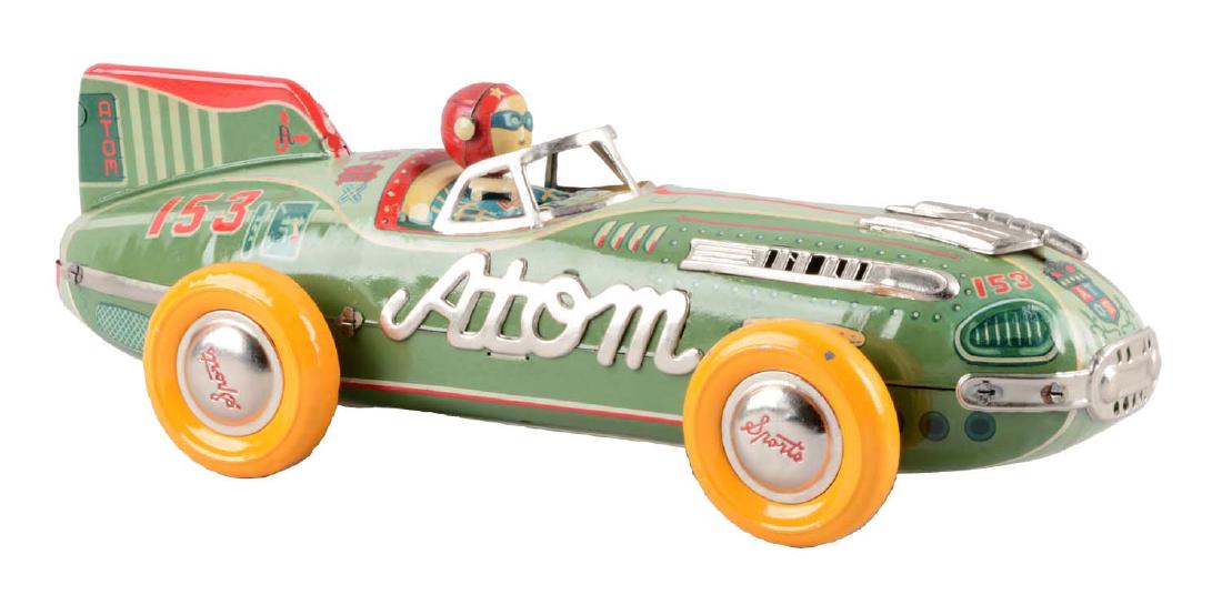 Japanese Tin Litho Friction Atom Race Car. (1 of 2)