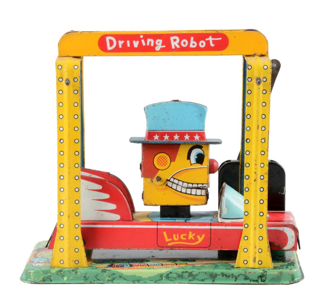 Japanese Tin Litho Wind Up Driving Robot. (1 of 3)