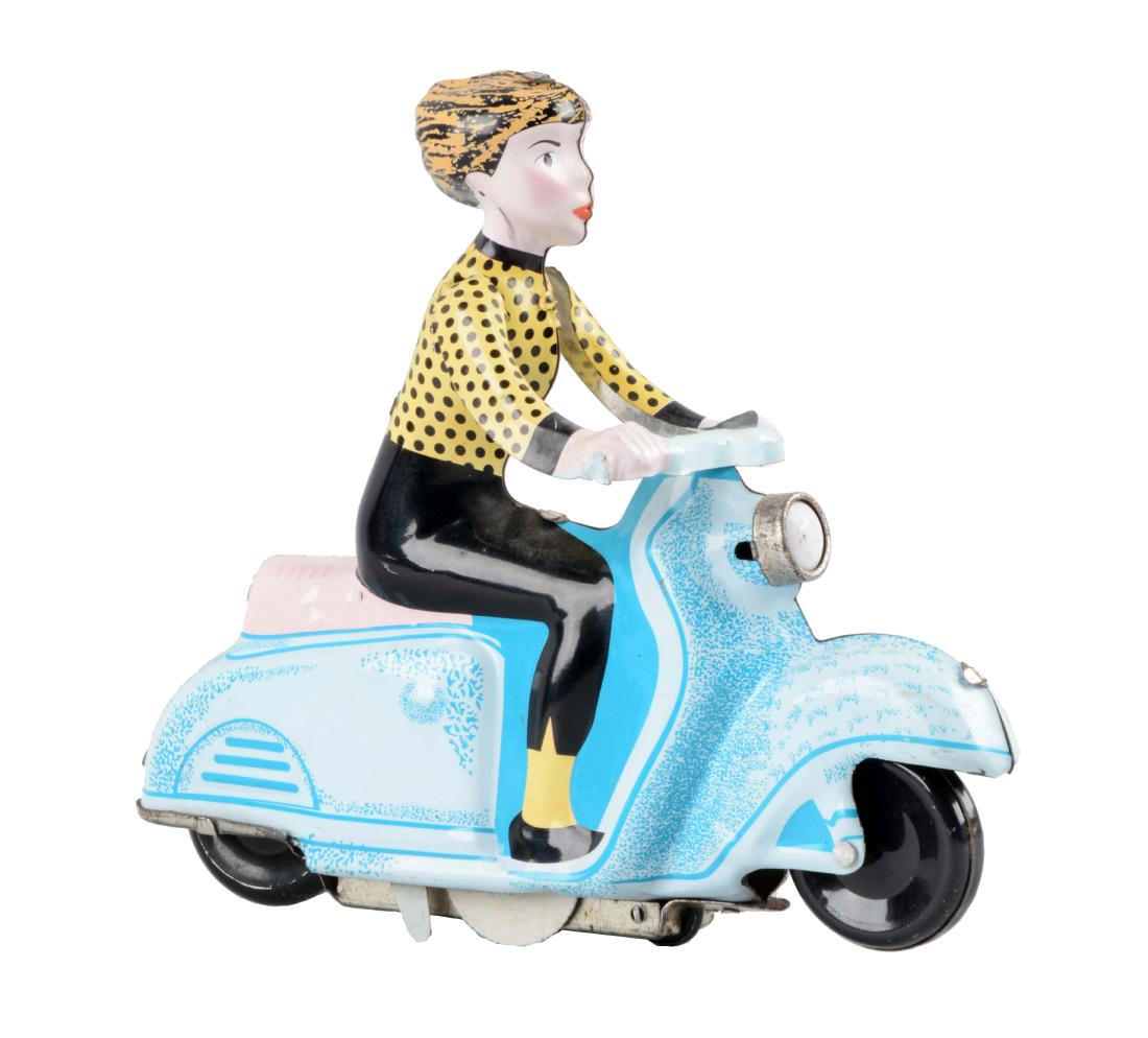 Tin Litho Wind-Up Woman Riding Scooter Toy.: Unmarked but probably made in India. A little more contemporary. (Near Mint). 7" x 6".