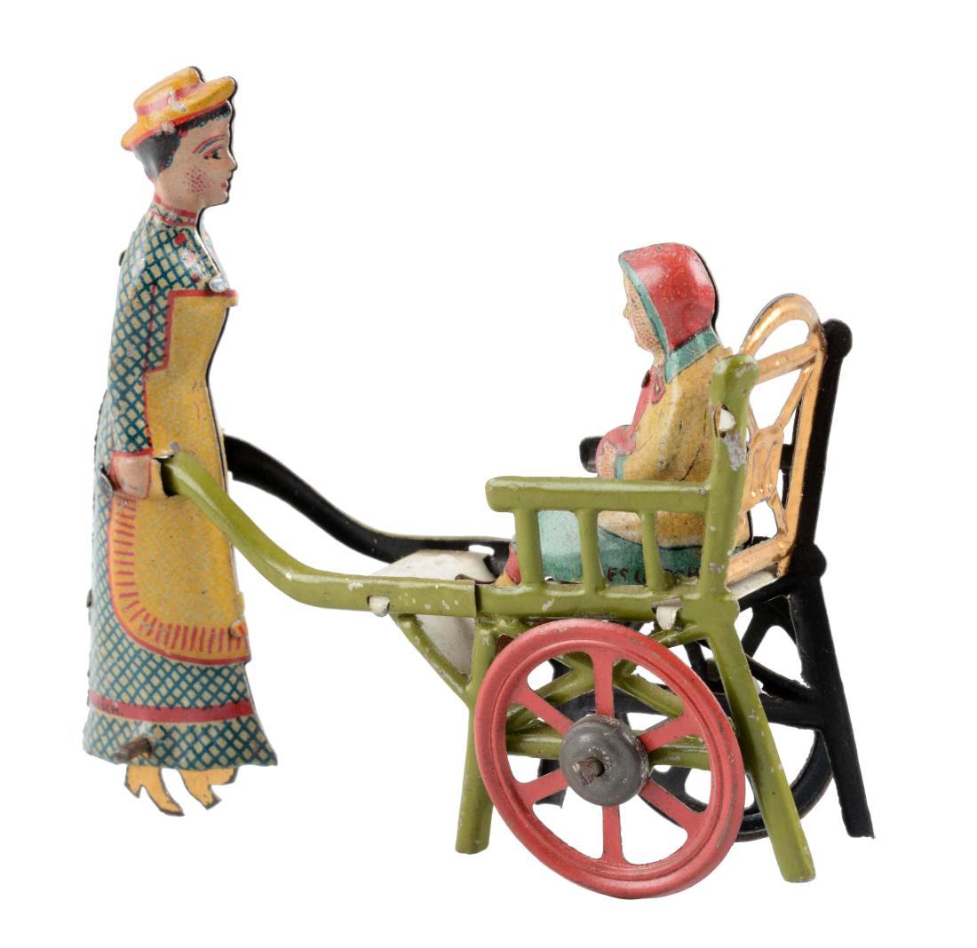 German Tin Litho Nanny Pushing a Child Penny Toy. (1 of 2)