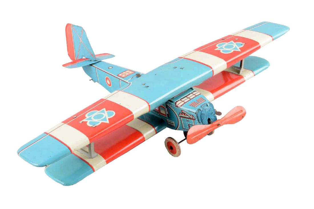 European Made Tin Litho Wind-Up Bi-Wing Airplane Toy. (1 of 2)