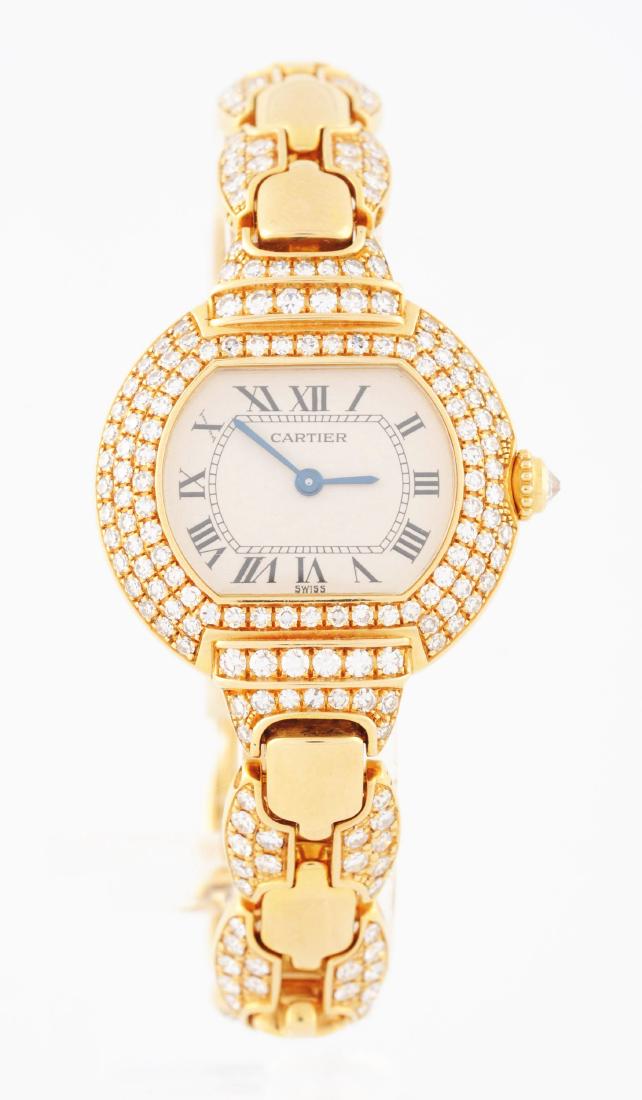 Cartier Paris Quartz: Model: Paris Quartz Brand: Cartier Reference Number: Gender: Womens Case Material Type: yellow gold Dial Color: off-white Display: Analog Watch Year: Box & Papers: NONE External Wear: excelent - near