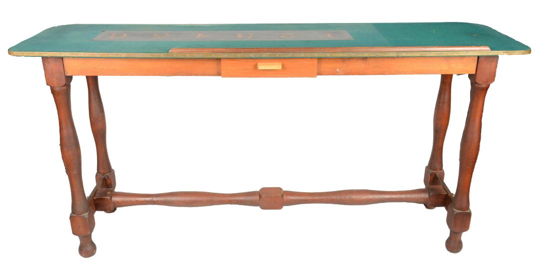 Tall Chuck-A-Luck Table.: These rare, high tables have enough room for a Hieronymus Tub or Chuck-A-Luck cage. It has a worn, green felt top with a hand painted oil cloth layout in black, gold, and red. The top has brass edging
