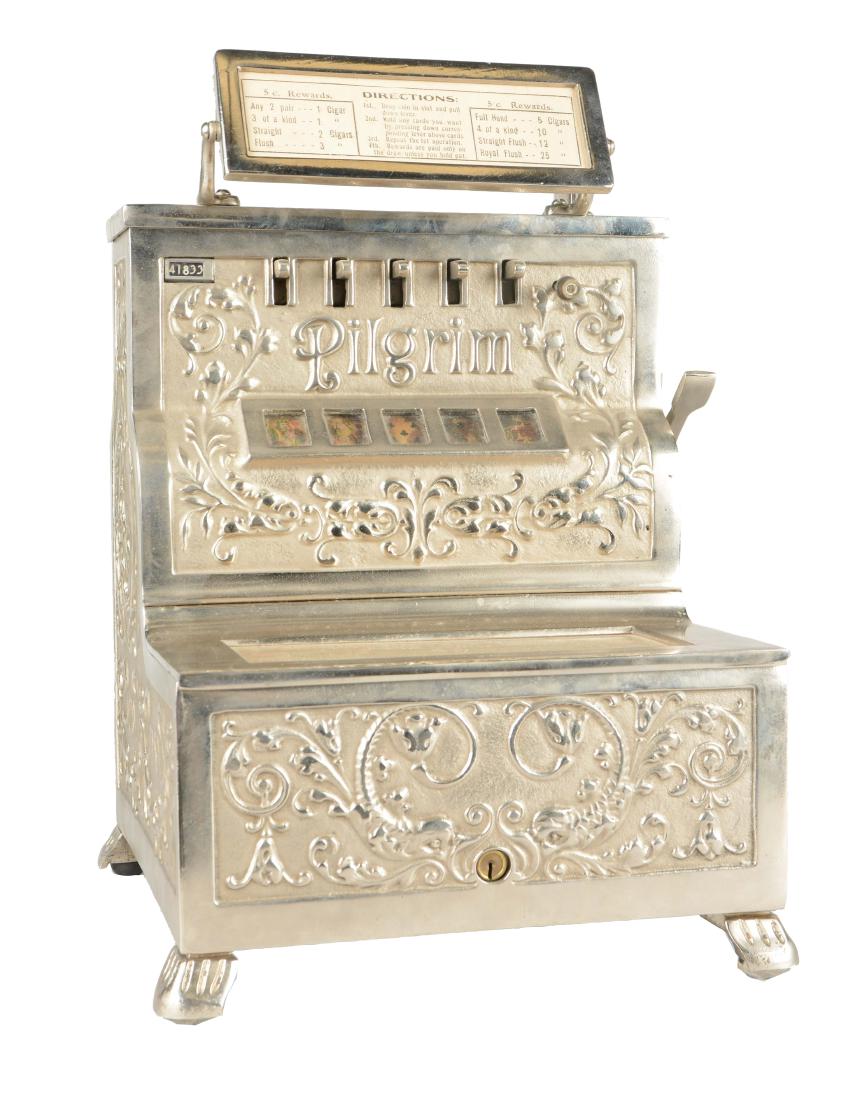 **5¢ Caille Bros. Pilgrim Trade Stimulator.: Cast iron countertop poker machine is an older restoration and has Watts nickel plating. With original back door. Two keys are provided. 10-1/2"D x 10-1/2"W x 15"T.