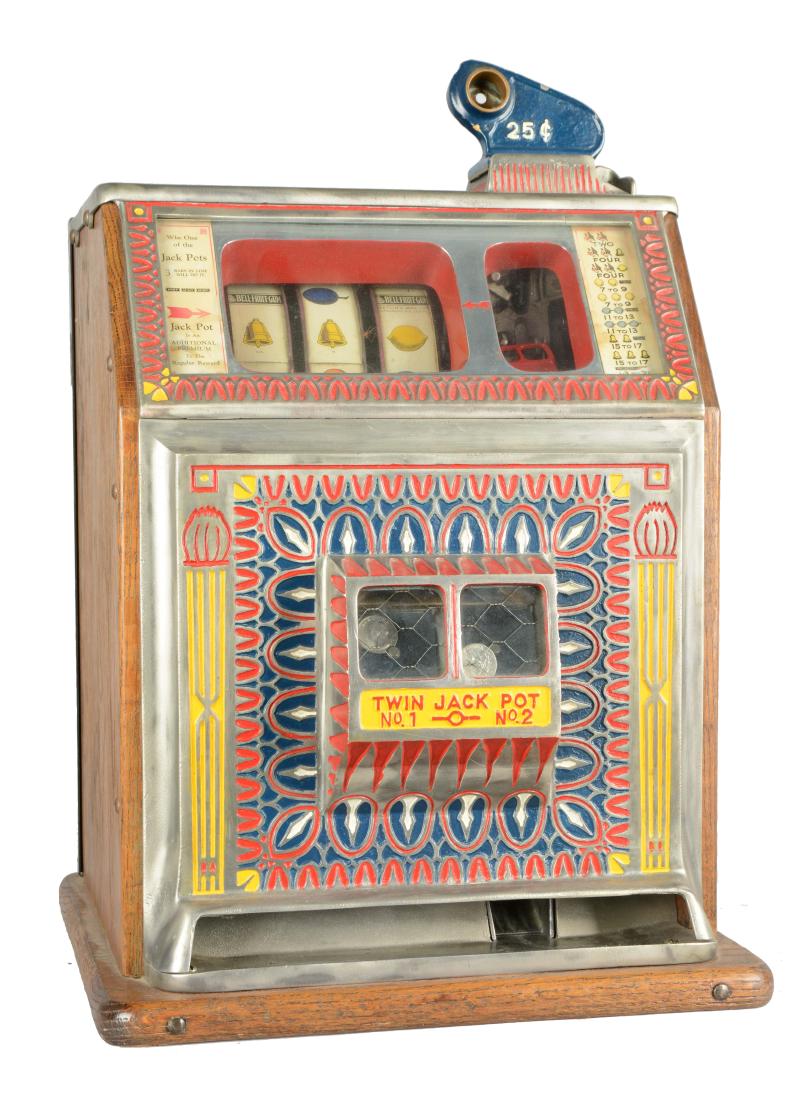**25¢ Watling Mfg. Co. Blue Seal Twin Jackpot Slot: This three reel gooseneck bell machine shows minor wear throughout with an older repaint and a replacement back door. In working order with complete and intact jackpot refill. Includes two keys. Circa