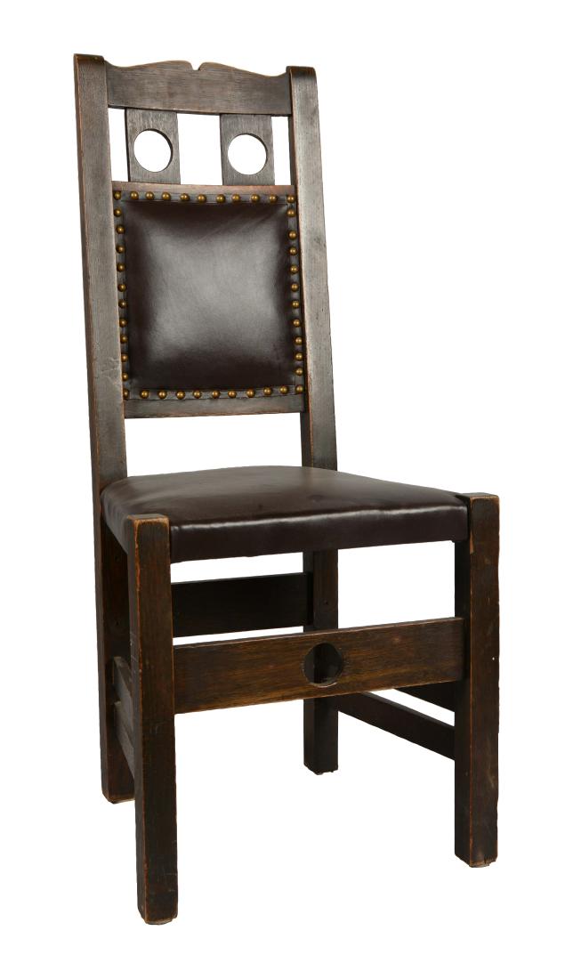 Wood And Leather Chair.: Manufactured by Stickley Bros. of Grand Rapids, Michigan. This chair has dark stained wood, leather in nice condition held in place by brass dome tacks. 41" x 18" x 19".