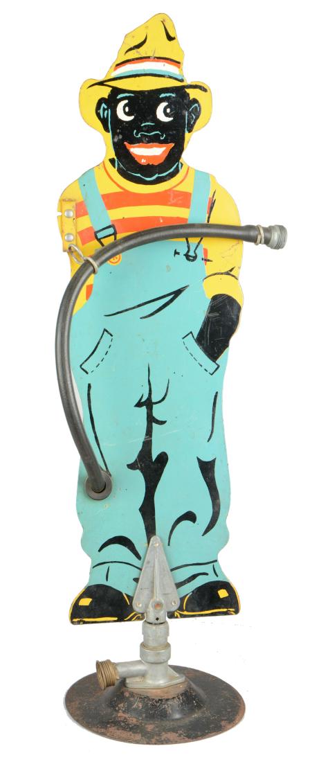 Black Americana Die-Cut Metal Sprinklin' Sambo Lawn: Originally intended to rotate on its base as it watered the lawn, this sprinkler figure features a smiling African American man wearing a yellow with orange stripe T-shirt and green coverall. Hose att