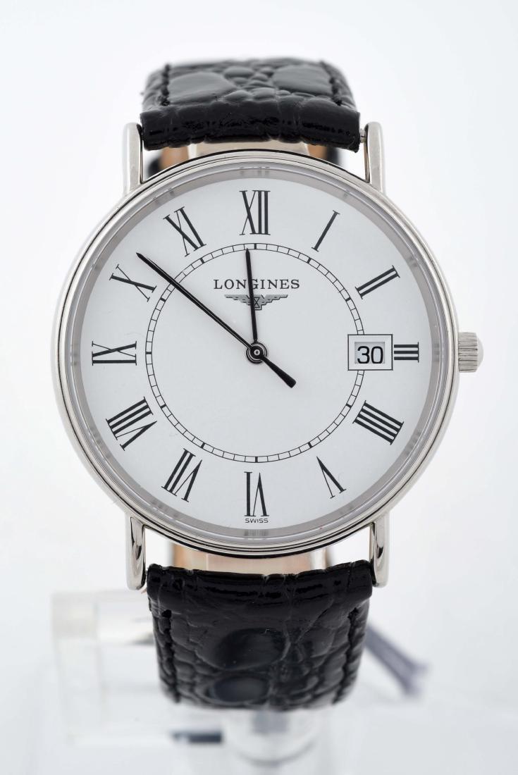 Longines Strap Watch Stainless Steel: Model: Quartz Strap Watch, Brand: Longines, Reference Number: L4.720.4, Gender: Mens, Case Material: Stainless Steel, Dial Color: White, Display: Analog, Watch Year: Circa 2000, Box & Papers: Both,Ext