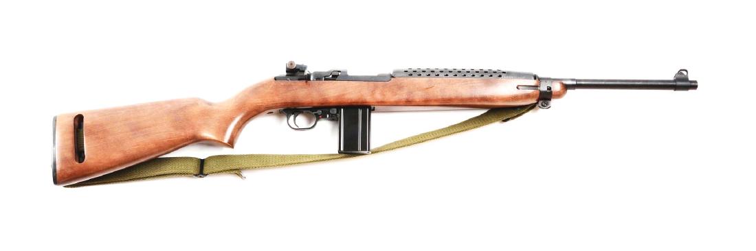 (M) Universal Firearms M1 Semi-Automatic Carbine.: Blued barrel action 20 round box magazine and slotted steel hand guard. Varnished walnut stock complete with oiler and canvas sling. Excellent condition with only a few light storage marks, showing li