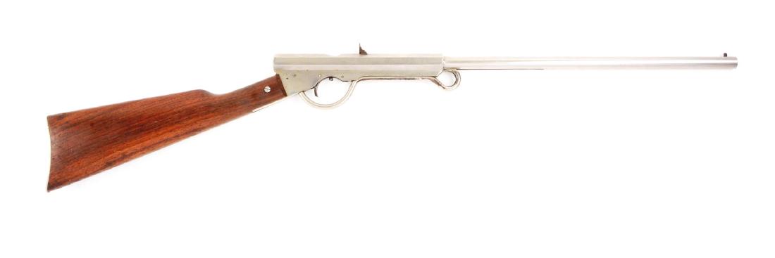 Picture Box Quackenbush No. 2 Air Rifle.: This beautiful rifle comes in its original paste board box with exterior picture label and interior labels. Has the spoon loading port behind rear sight, nickel finish and walnut stock. Retains 98% al