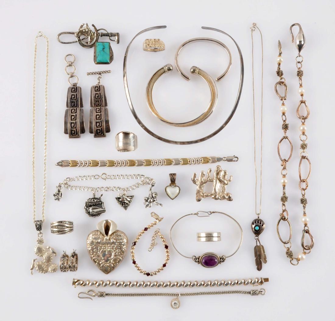 Lot of 20+: Large Lot of Mostly Sterling.: Lot includes two braclets by Tiffany, pins, necklaces, earrings, rings and other bracelets. Condition: (Excellent).Dimensions: