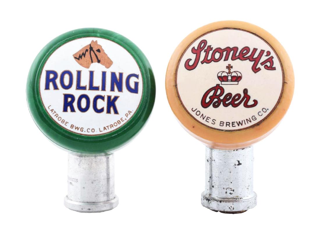 Lot Of 2: Rolling Rock & Stoney's Beer Taps.: Stoney's has some wear to the face and fading to case. Rolling Rock is clean.Condition(Very Good - Excellent).DimensionsLargest : 2 -1/2" T.
