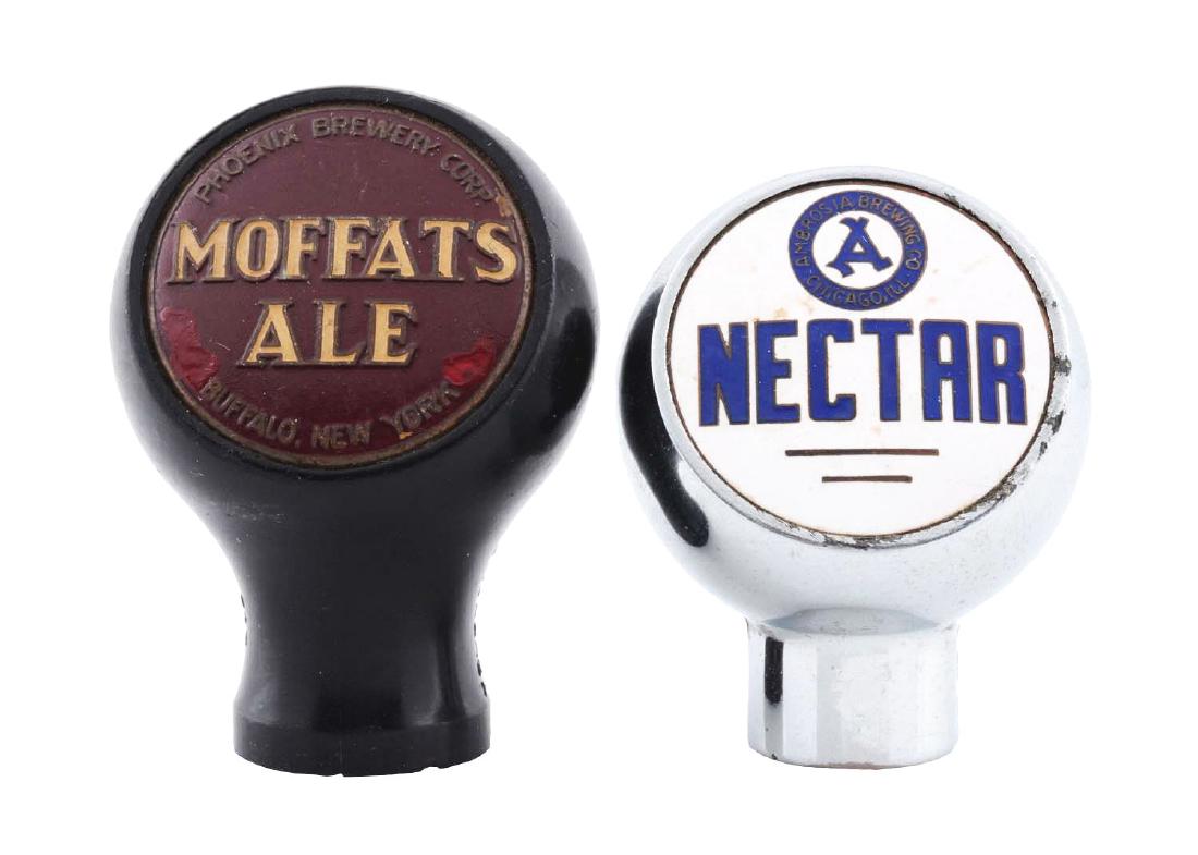 Lot Of 2: Moffats Ale & Nectar Beer Taps.: Nectar has some wear and scratching to the face. Moffats has discoloration to the face missing insert. Condition(Very Good).DimensionsLargest : 2 -1/2" T.