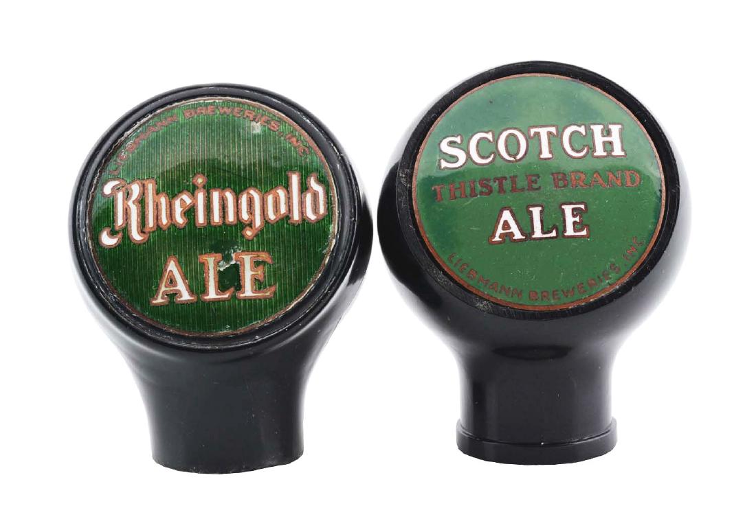 Lot Of 2: Scotch & Rheingold Beer Taps.: Scotch Ale is clean overall. Rheingold has wear and chips on the face. Condition(Very Good - Excellent).DimensionsEach : 2" T.