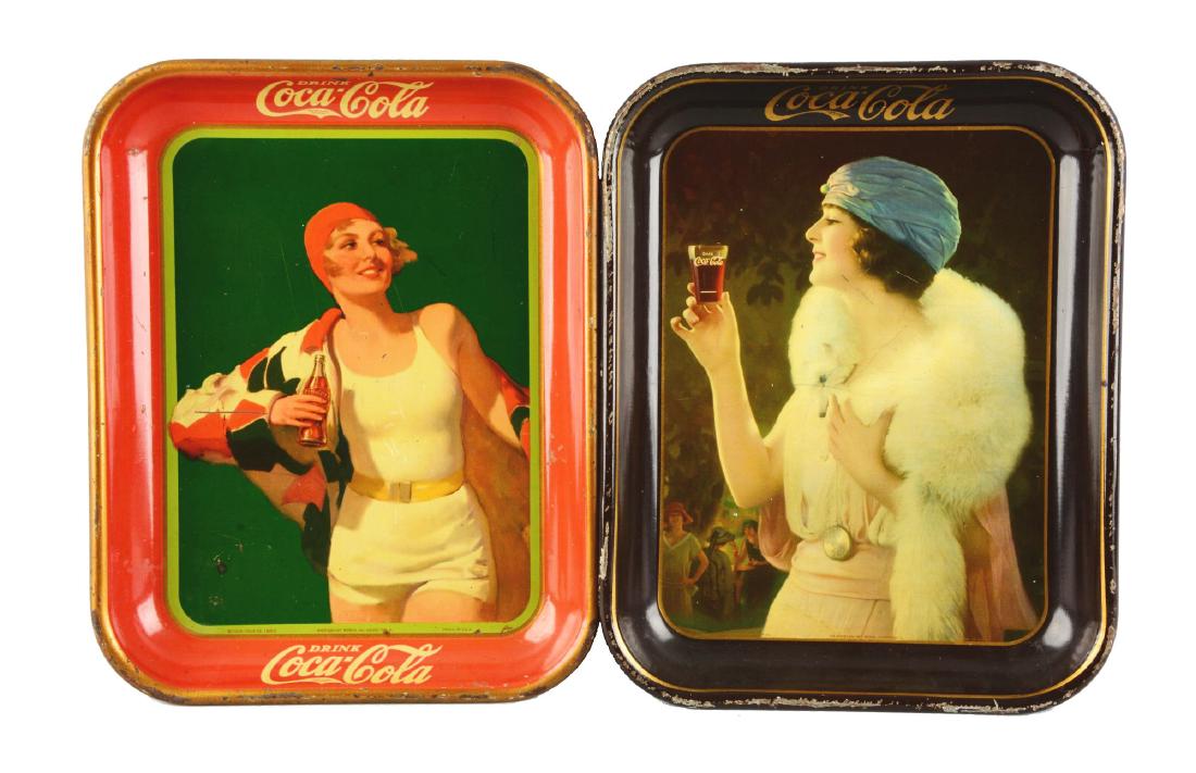 Lot Of 2: 1925 & 1930 Coca-Cola Tin Trays.: The 1930 tray has some tiny nicks and scrapes in the field as well as a small ding. The rim has moderate paint loss and scrapes. The 1925 tray has some light scrapes in the field and the rim has some 
