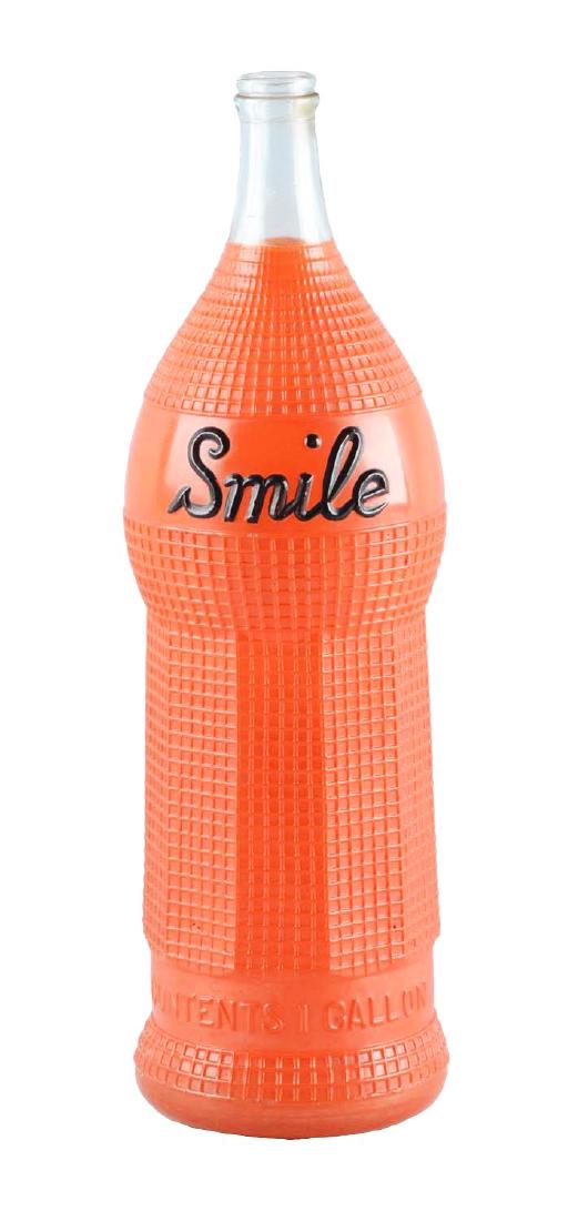 Large Glass Smile Soda Advertising Bottle. (1 of 2)