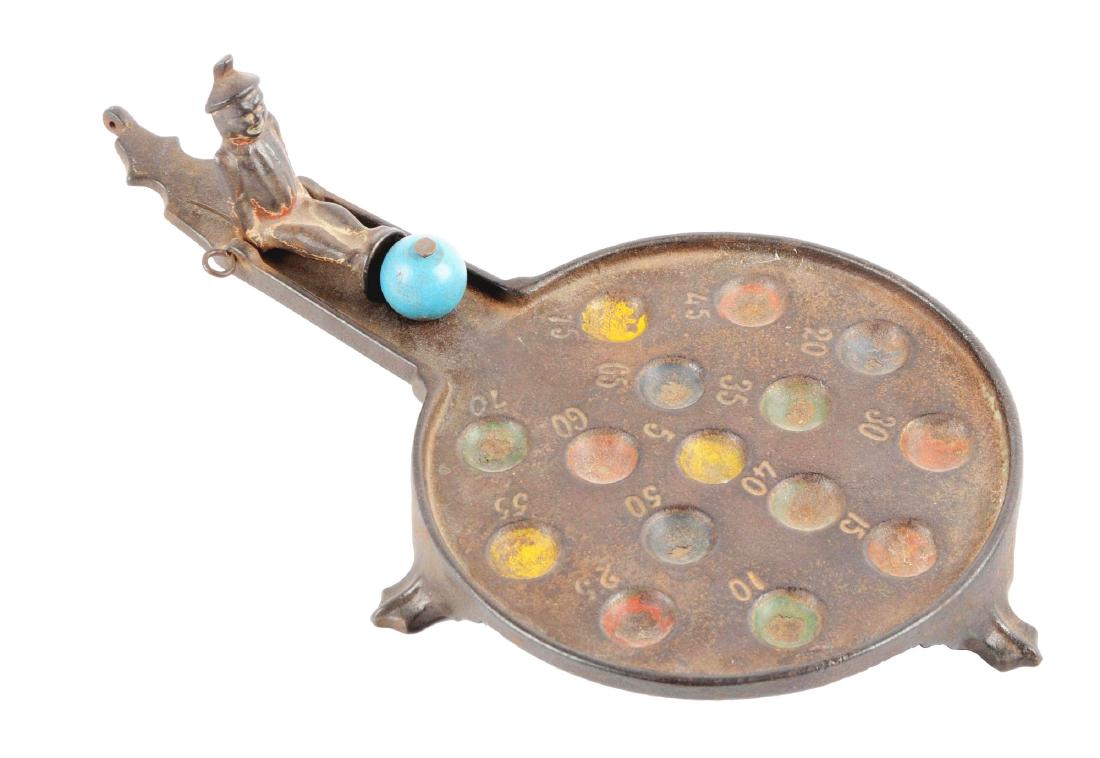 Cast Iron Marble Game.: (JY).Condition:(Good).Dimensions:10 -1/4" x 5 -1/4".