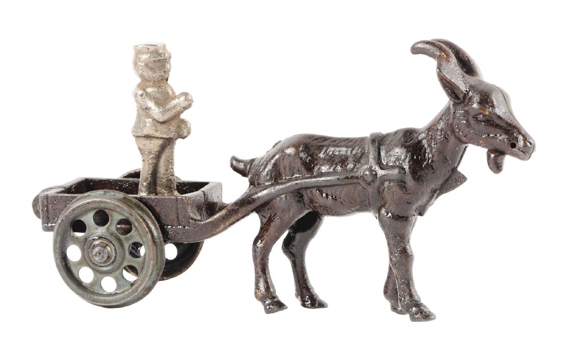Cast Iron Goat Drawn Cart. (1 of 2)
