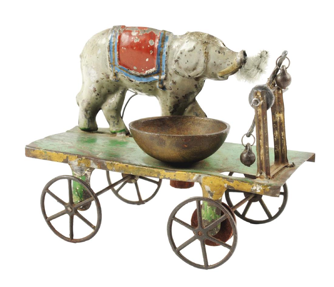Early American Tin Elephant Platform Toy. (1 of 3)